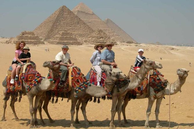 All-inclusive Private Day-Tour to Giza Memphis Saqqara Camel Ride - The 30-minute camel ride around the pyramids
