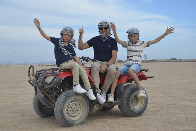 ATV Quad Bike Buggy Car and Dinner Family Safari - Hurghada - Riding the quad bike across the open desert