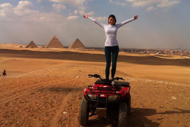 ATV Quad Bike Ride At GIZA Pyramids & BBQ Dinner. - Riding an ATV beside the Giza Pyramids
