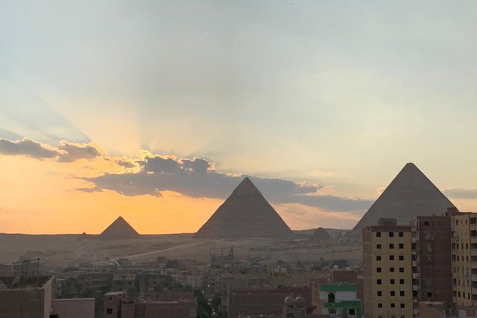 Best Full-Day Tour to Giza Pyramids Egyptian Museum and Bazaar - Giza Pyramids: two and a half hours among the great monuments
