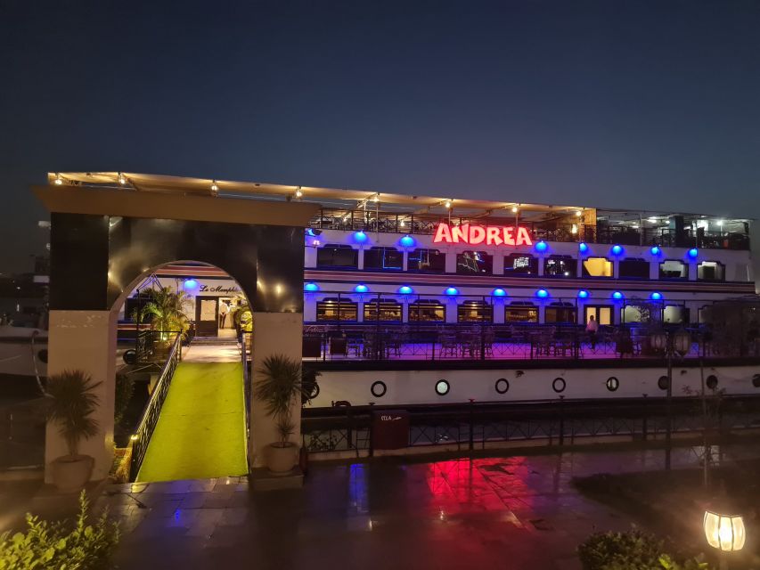 Cairo: Nile Dinner Cruise with Belly Dancer Show and Music - The upper deck and Cairo by night