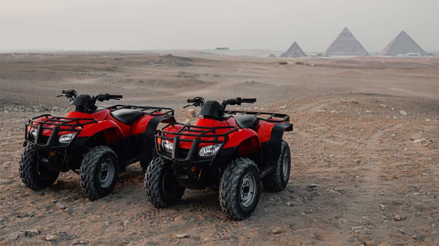 Cairo: Private Quad Bike Desert Tour with Pyramids & Sunset - Sunset, camel time, and the slower side of the desert