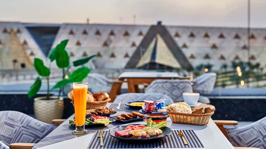 Cairo: Sunrise Camel Ride, Pyramids Tour & Local Breakfast. - Breakfast with foul, falafel, and pyramid views