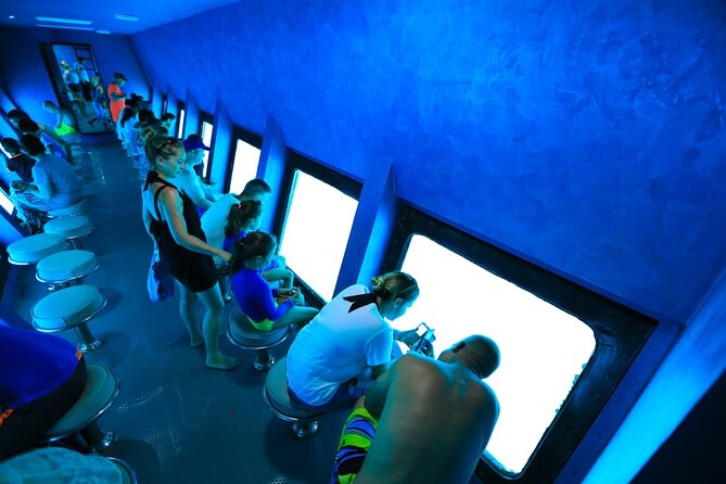 Conquest Semi Submarine Snorkeling Trip With transfer -Hurghada - Boarding the Semi-Submarine
