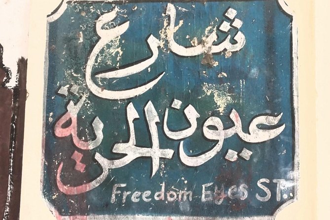 Downtown Cairo Half-Day Tour with Egyptian Dinner - Walking through downtown Cairo’s architecture and graffiti