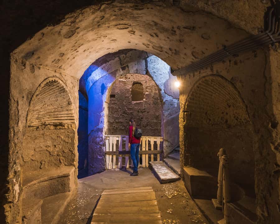 From Cairo: Historical Alexandria Shared Day Tour with Lunch - Entering the Catacombs of Kom el Shoqafa