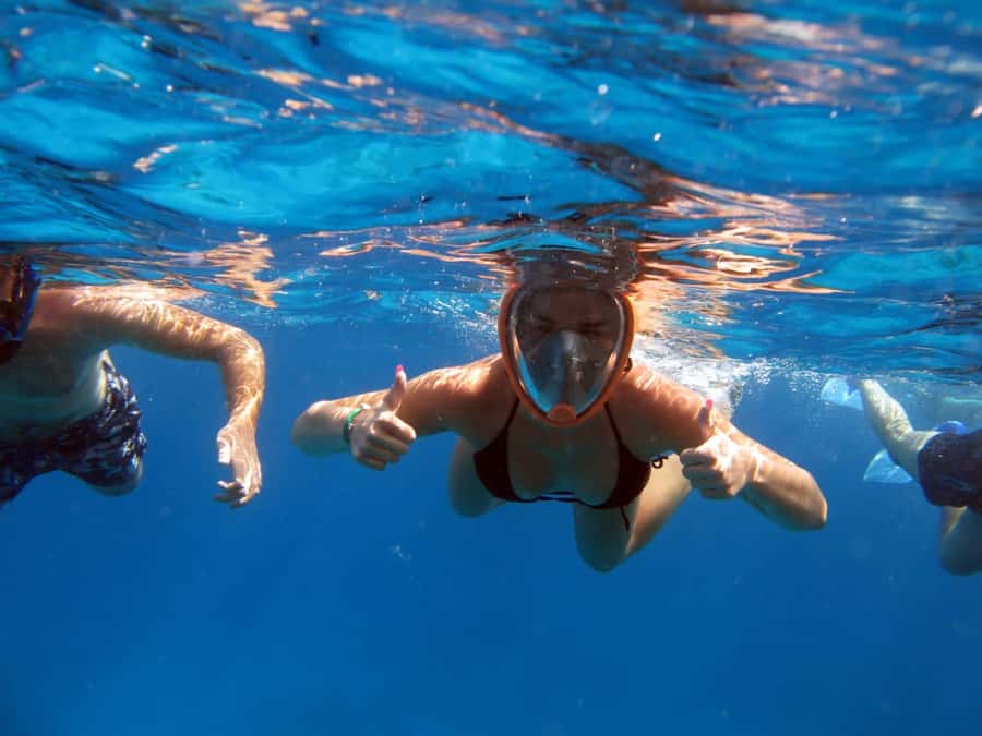 From Sharm: Half day Snorkeling Trip with Lunch - Boarding a spacious boat for the Red Sea