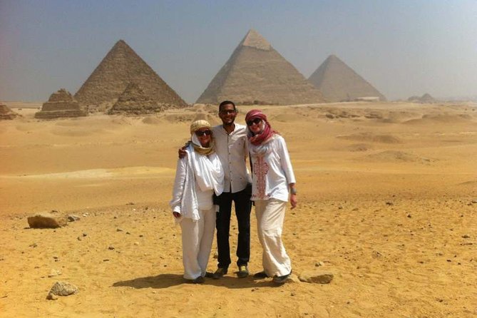 Full-Day Tour From Cairo: Giza Pyramids, Sphinx, Memphis, and Saqqara - Giza Pyramids: begin with the icons