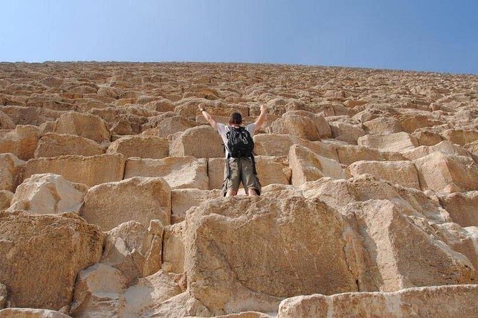 Giza Pyramids and The Sphinx Walking Tour - A guide who teaches and takes photographs