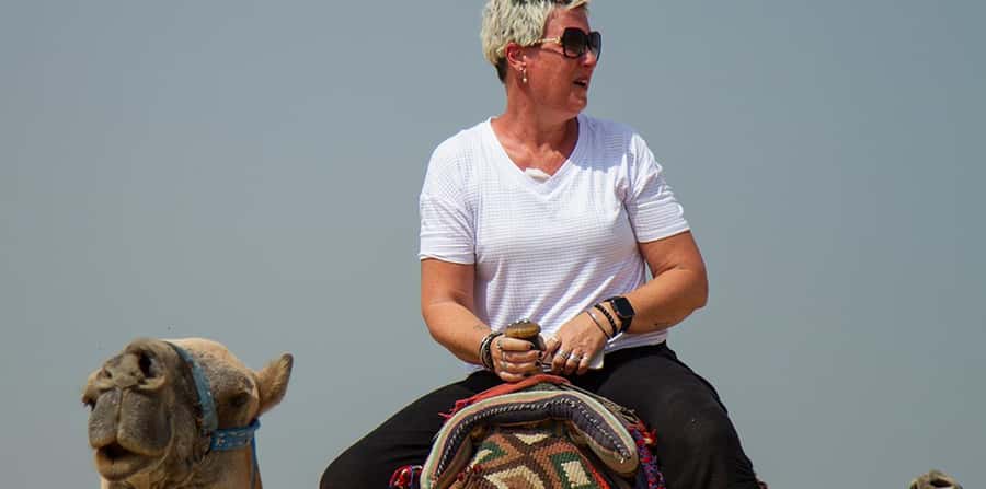 Giza: Pyramids at Sunset Guided Camel Tour - Meeting the camels in the Giza desert
