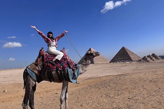 Guided Tour to Giza Pyramids ,Sphinx, Camel & inside the pyramids - The Great Pyramid and the Giza complex