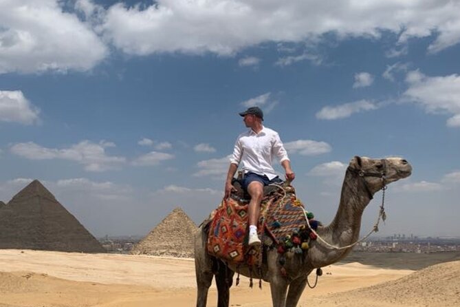Half Day private guided tour Giza Pyramids,Sphinx,lunch,camel rid - A private start from your hotel