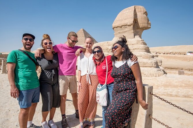 Half-Day Saqqara Pyramids and Memphis Tour from Cairo - Reading the Step Pyramid with a guide