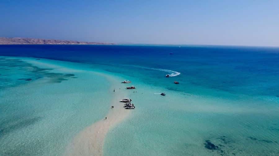 Hurghada: Elegance Yacht Cruise To Orange & Magawish island - Guides, crew, and the private-trip difference