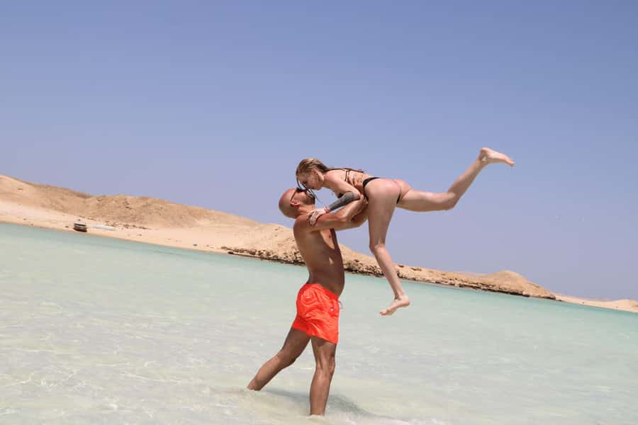 Hurghada: Orange Bay Island with breakfast, lunch & watersports - Banana boats, sofa rides, and optional parasailing