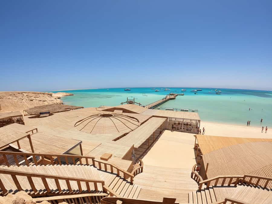 Hurghada: Orange & Giftun Island Cruise with Massage & Lunch - Small Giftun snorkeling: coral, fish, and crew support