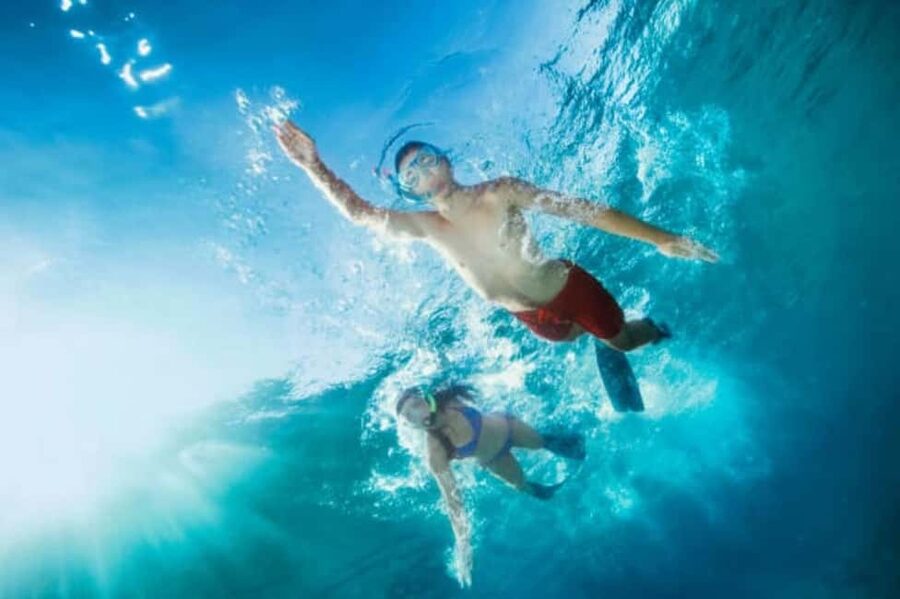 Hurghada: Orange Island Yacht Trip with Lunch & Water Sports - Crew support and the shared-boat feel