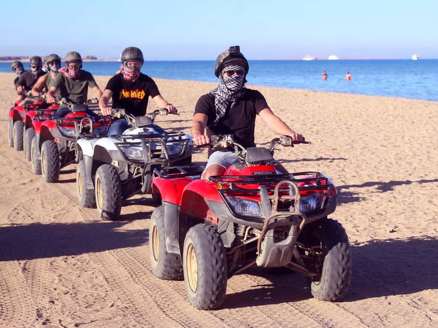 Hurghada: Quad Bike Tour of the Desert and Red Sea - The five-minute camel ride is a photo stop
