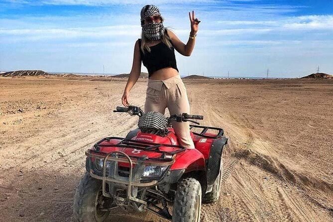 Hurghada Safari Quad and Camel Ride with Night Show and Dinner - Tanoura, belly dance, and fire performance
