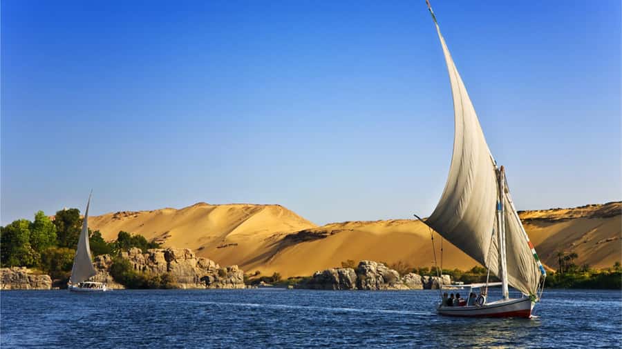 Luxor: Private Felucca Ride with Panoramic Nile Views - Boarding the traditional felucca