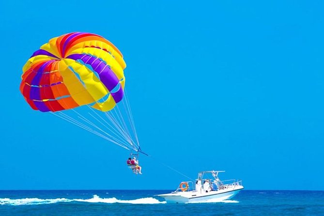 Parasailing Fly in The Sky With Transportation - Hurghada - Getting fitted for the parasail