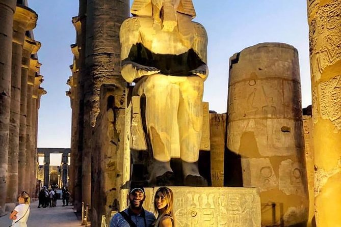 Private East and West banks in Luxor with hotel pick up and drop off and lunch - The Colossi of Memnon, a quick roadside pause