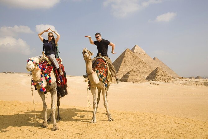 Private Half Day Giza Pyramids Tour with camel & Lunch - What the guide adds to the monuments
