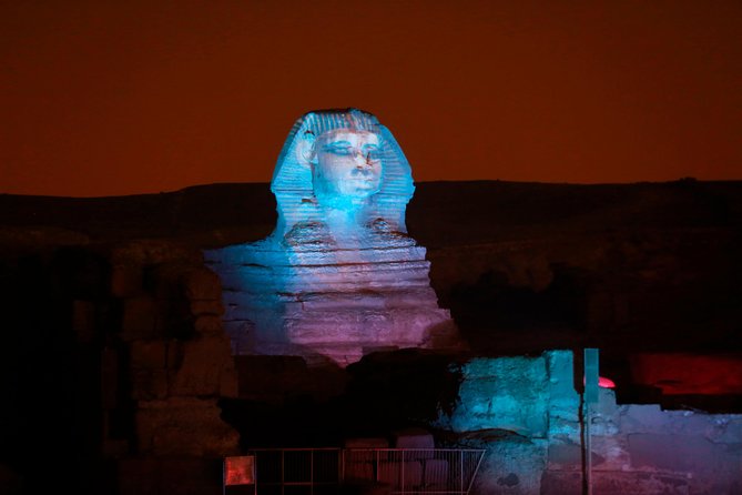 Sound and light show with Dinner with Pyramids view Roof Top Restaurant - The pyramids under colored lights