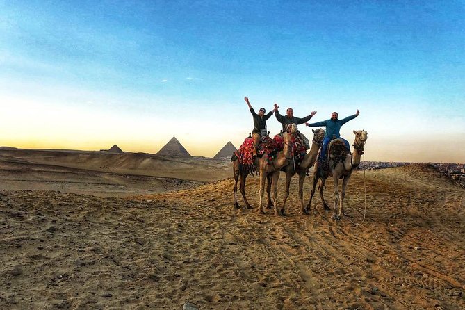 sunset at Giza pyramids by camels - The guide and driver can shape the evening