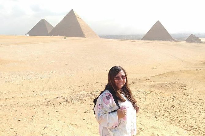 Top rated Giza Pyramids and Sphinx Tour from Cairo Airport - Guides, drivers, and the feel of the day