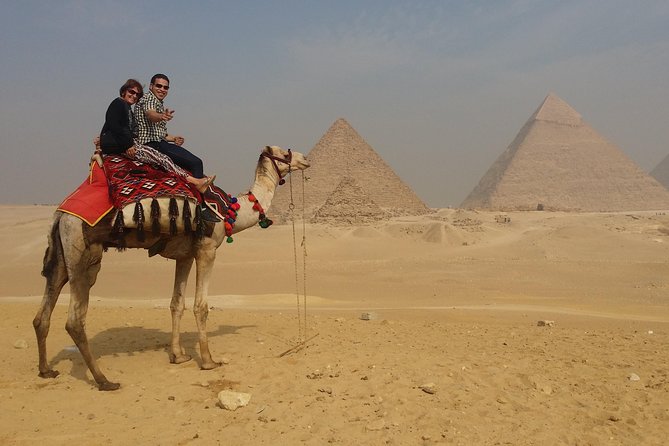 Unusual Desert Safari Tour Around Giza Pyramids During Sunset With Barbecue. - Quad Biking With the Three Pyramids in View