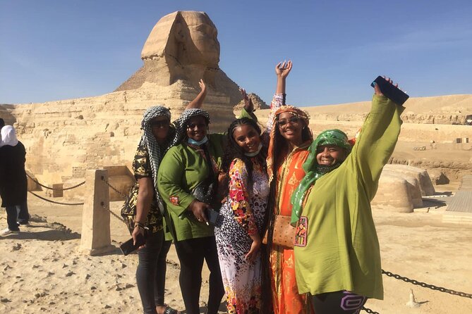 VIP Half Day Tour Giza Pyramids ,Great Sphinx and Cairo Food Tour - Optional camel rides and shopping stops