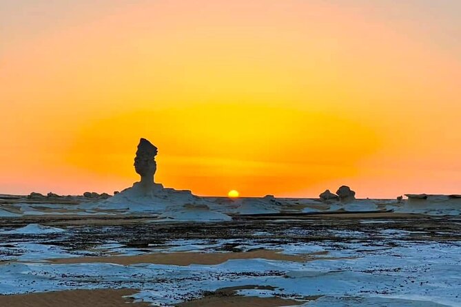 White & Black desert camping tour 2 Days 1 night From Cairo - Black Desert: dark hills beside the oasis