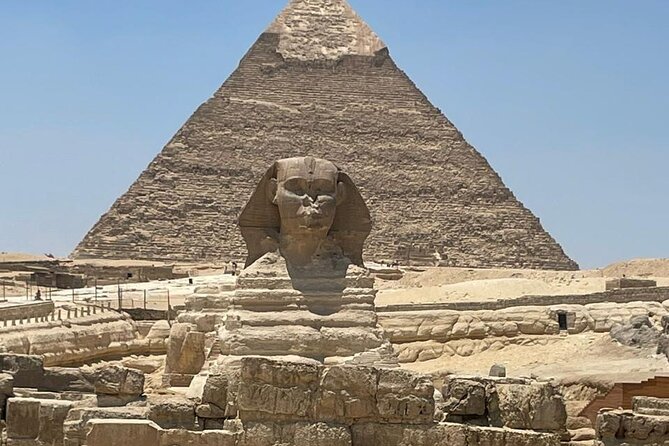 Your VIP Giza Tour: Pyramids, Camels & Authentic Egyptian food - The Great Pyramid of Khufu, your first major stop